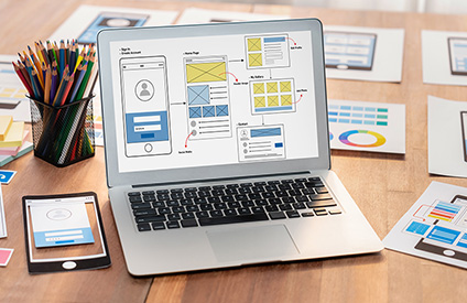 Digital wireframe design for web or mobile app UI on laptop. Scrutinize
